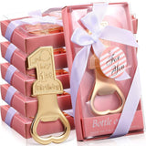 Gold bottle opener with 'My 1st Birthday' text in a pink box with a white ribbon.