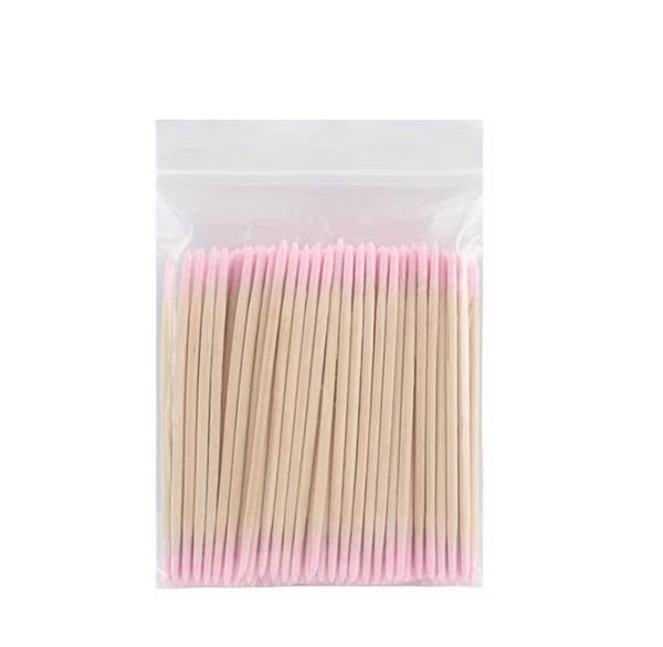 Double Head Wiping Wooden Swab Sticks. Pack of 100 wooden sticks with pink tips in a clear plastic bag