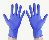 Black Nitrile examination gloves . Hand protection. Gloves for doctors and beauticians